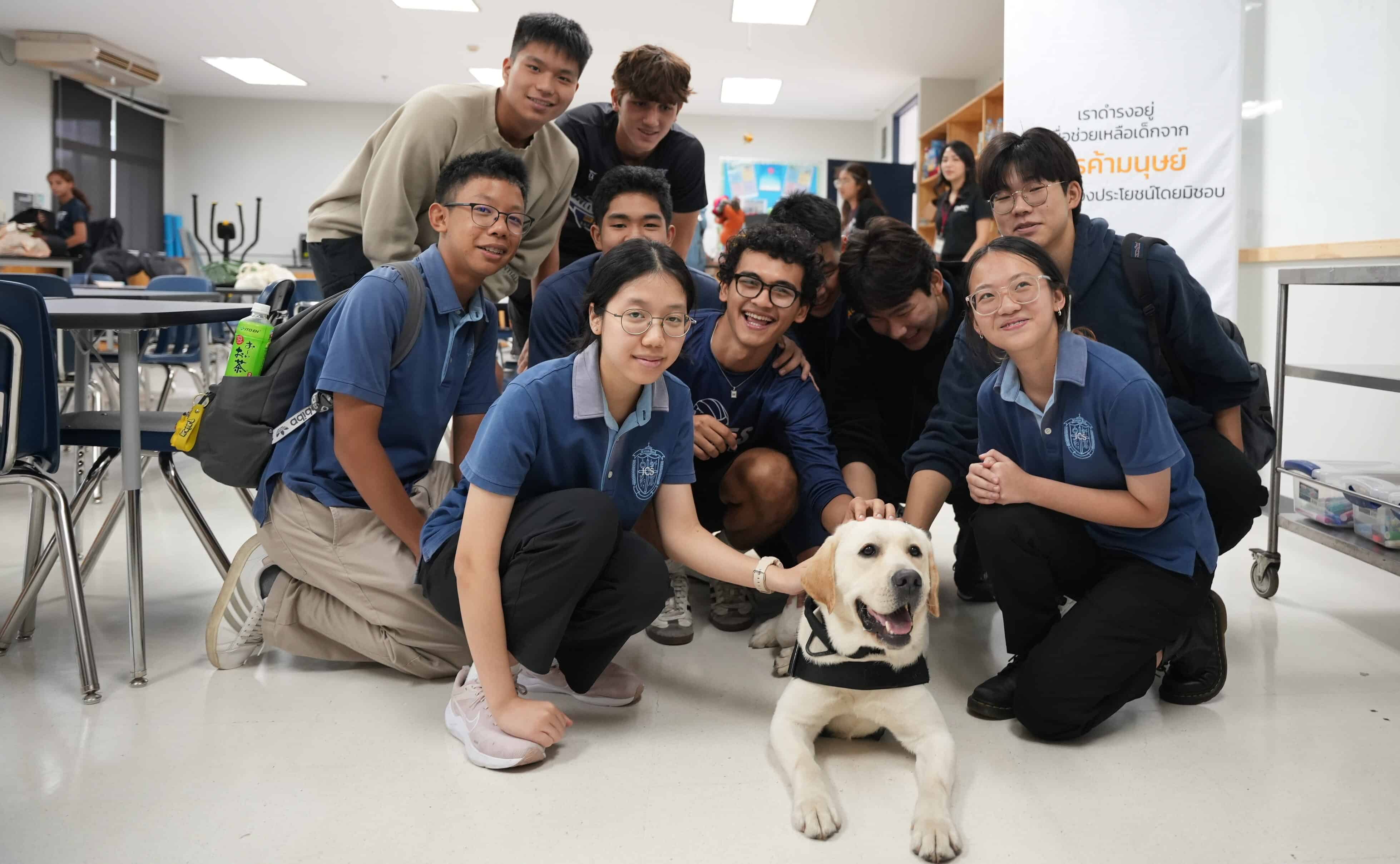 Kids together with K9 dog