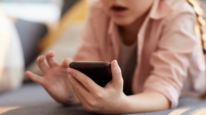 Little Kid Using Smartphone